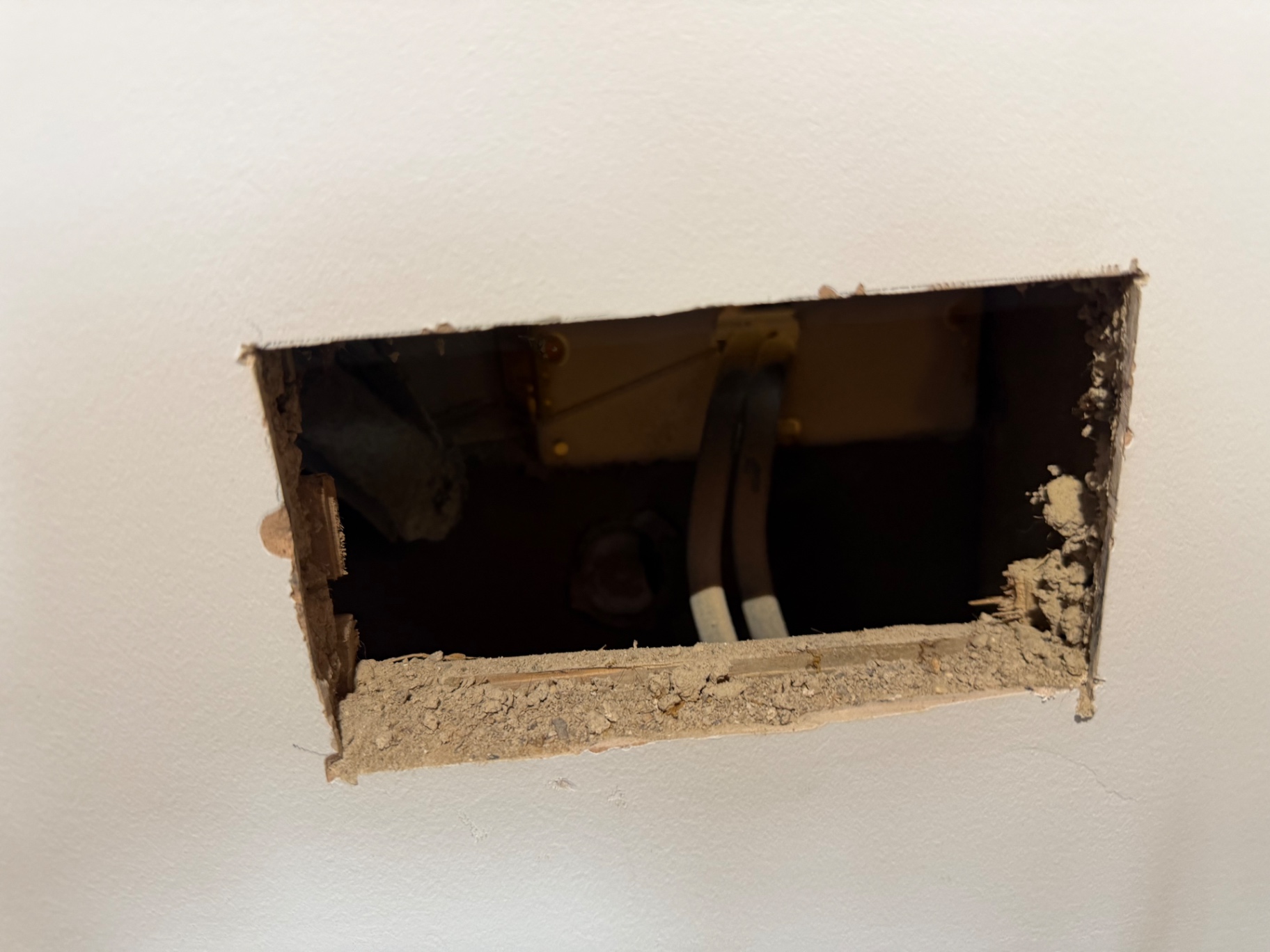 Chase opened up showing the cable drop behind the lath ready for the ring extension