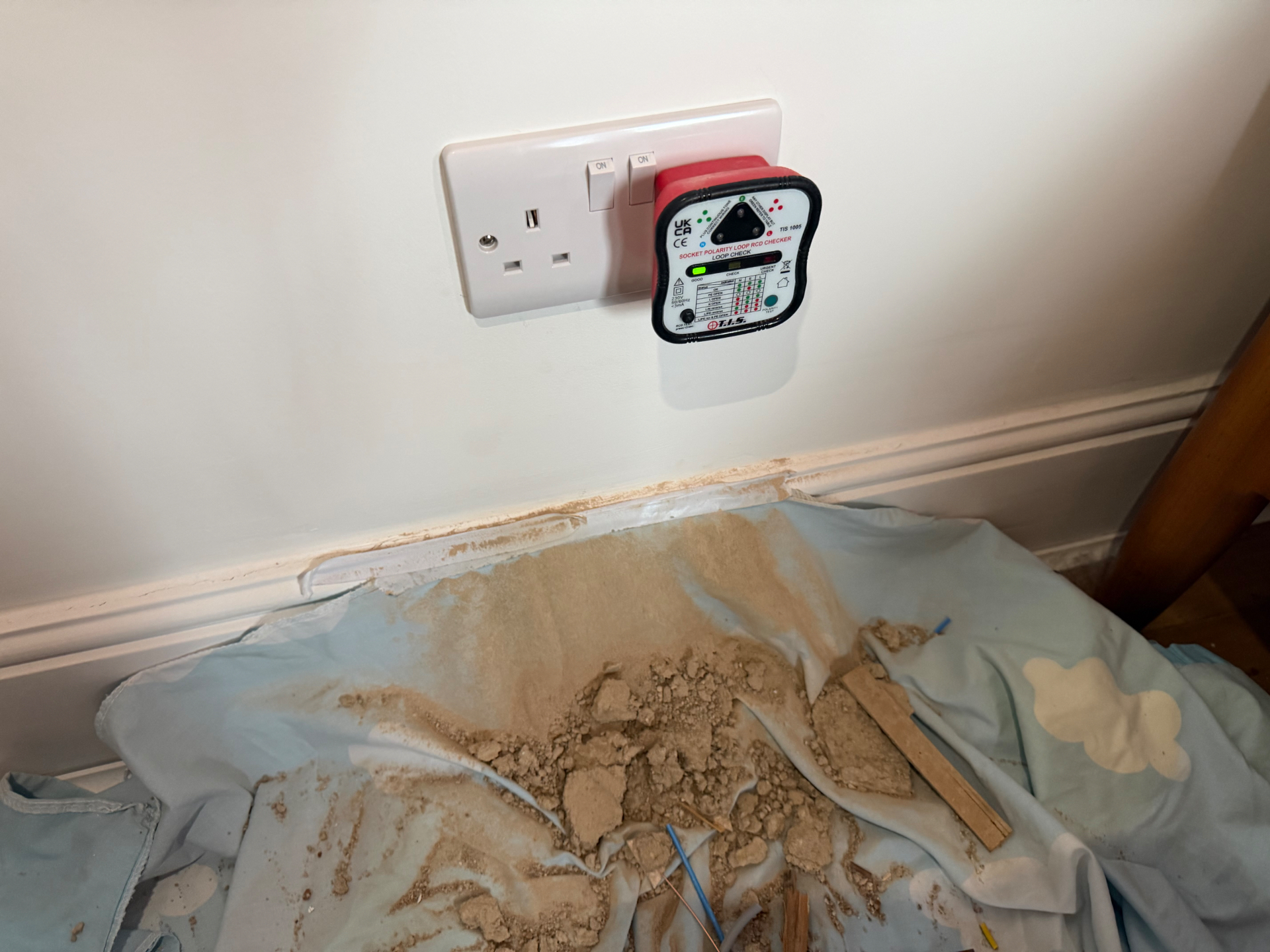 Just the final tidy-down to do — dust sheets, debris to be cleared and the finished socket left tested and ready to use