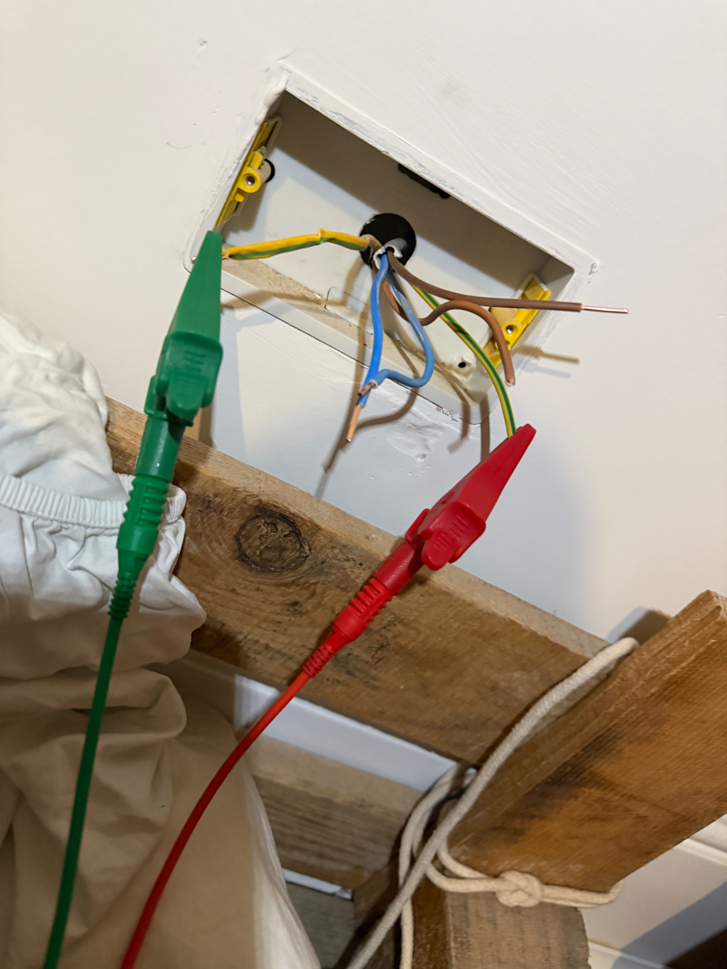 Test leads on the ring conductors ready for an R1+R2 end-to-end continuity test