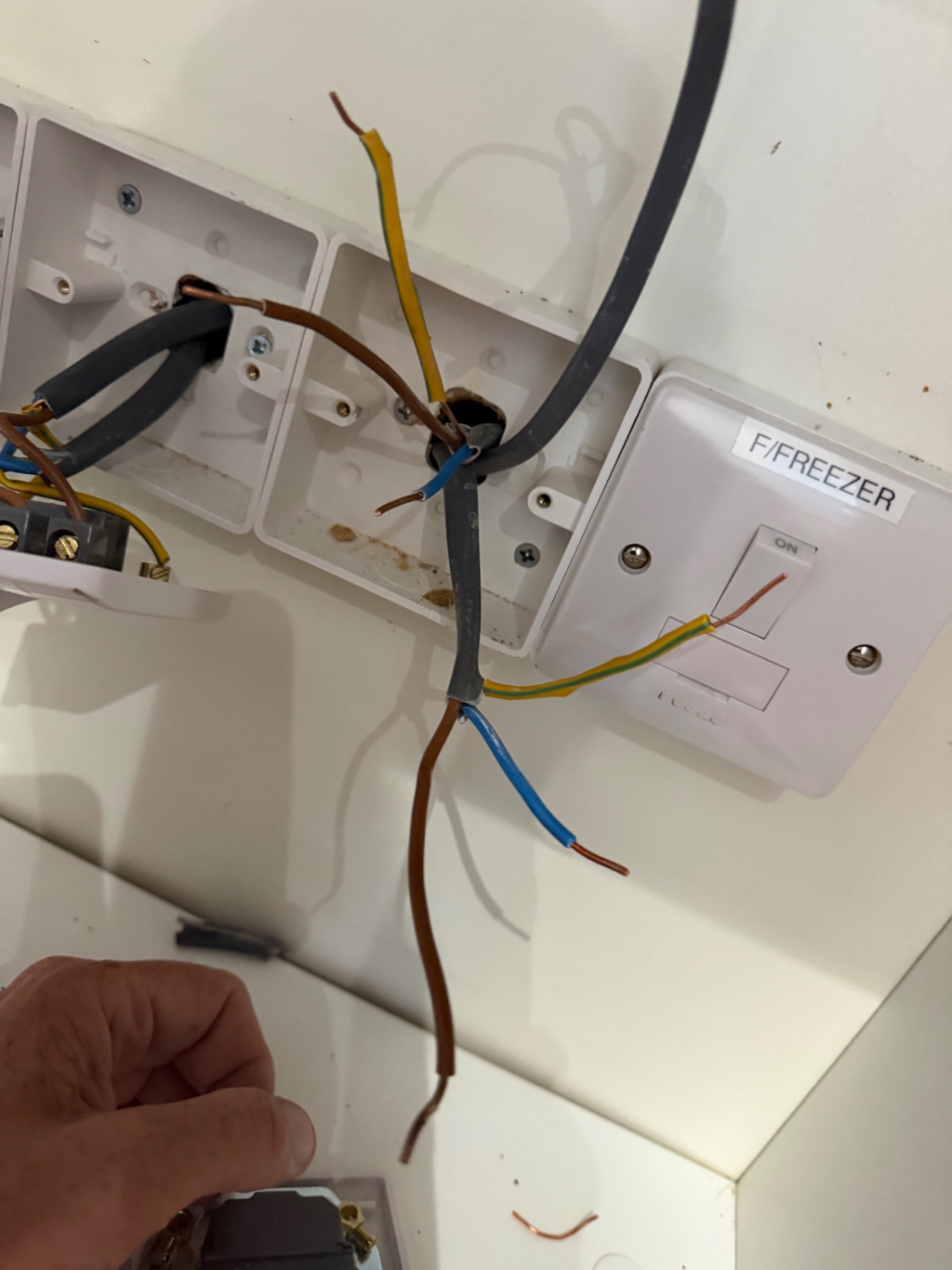 Conductors carefully released and separated for inspection — insulation checked for heat damage along the run.